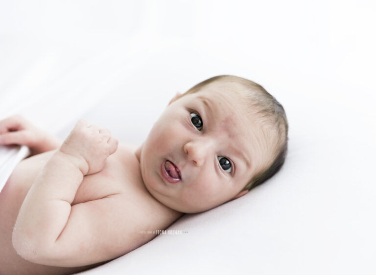 Baby Sticking Tongue Out Fiona Norman Photography